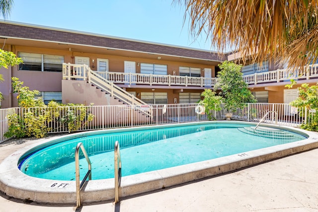 pool featuring fence