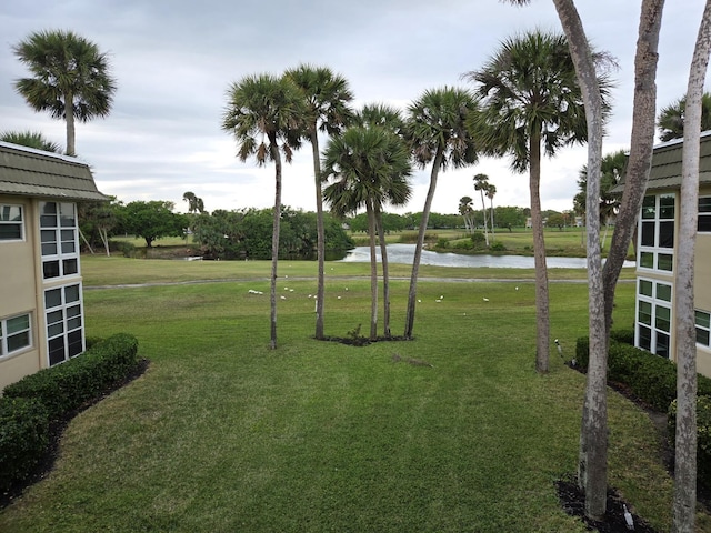 view of yard with a water view