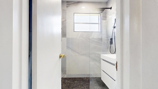 bathroom featuring vanity and walk in shower