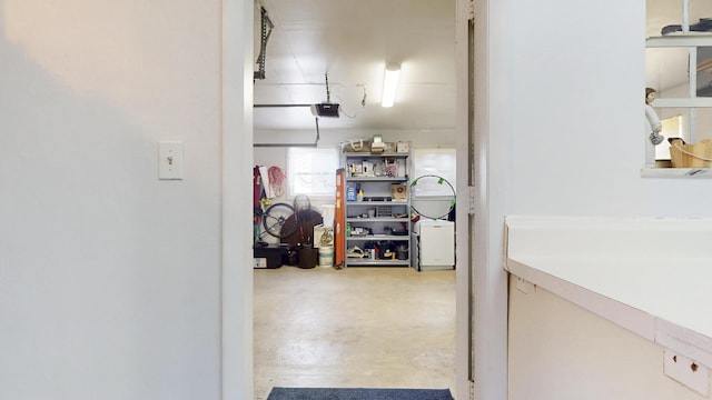 hallway with concrete flooring