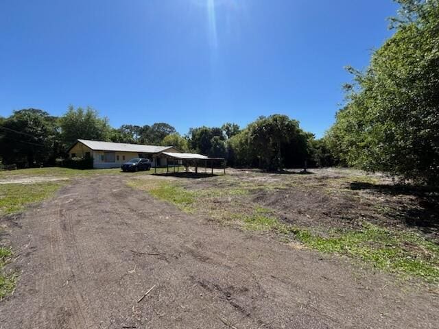 view of road with driveway