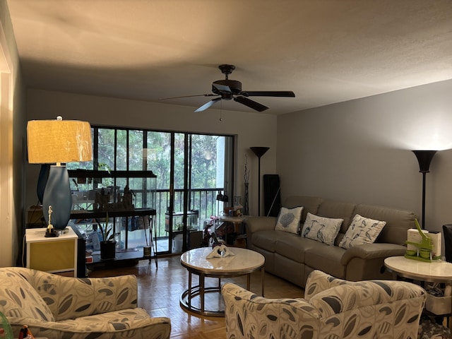 living area featuring ceiling fan