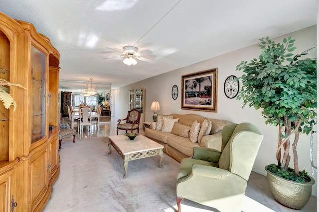 living room with light colored carpet and ceiling fan