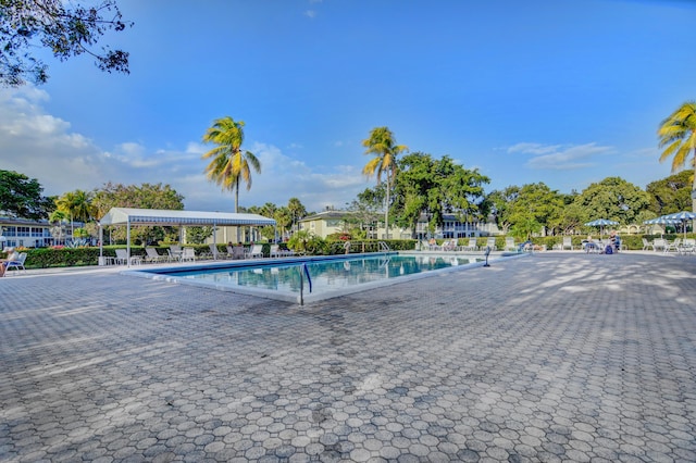 community pool with a patio