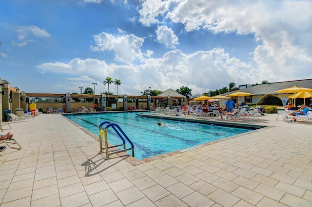 pool with a patio