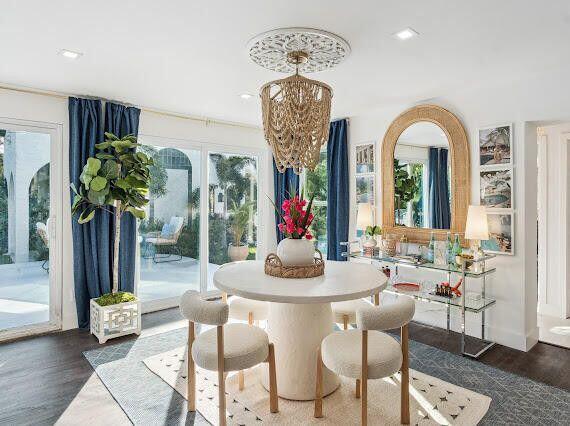 dining space with recessed lighting, an inviting chandelier, and wood finished floors