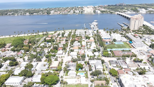 birds eye view of property featuring a water view