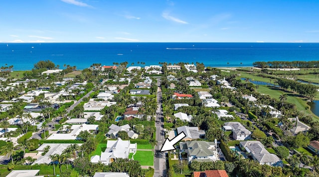 bird's eye view with a residential view and a water view