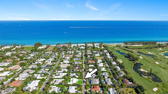 drone / aerial view featuring a residential view and a water view