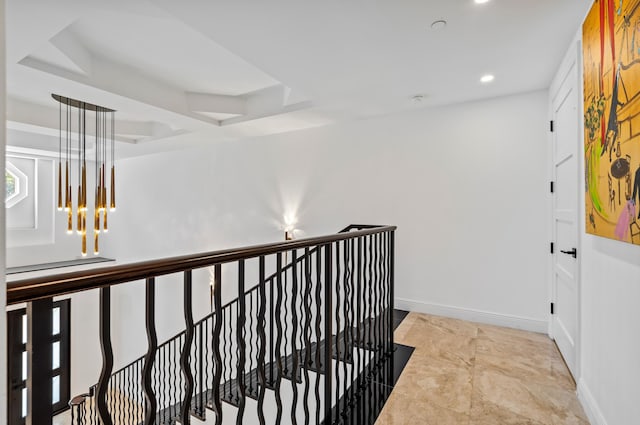 hall with an upstairs landing, a notable chandelier, recessed lighting, and baseboards