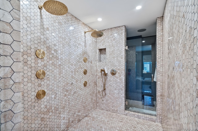 bathroom featuring tiled shower