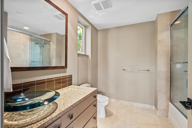 full bath featuring tile patterned floors, visible vents, toilet, backsplash, and vanity