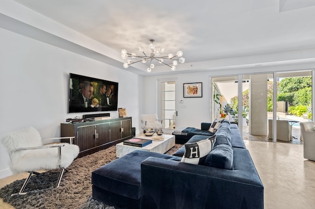 living area with a notable chandelier