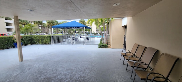 view of patio featuring a community pool