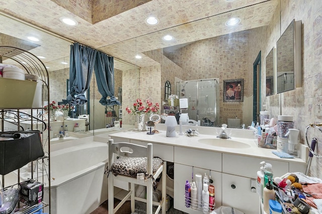 full bathroom with recessed lighting, a stall shower, and vanity