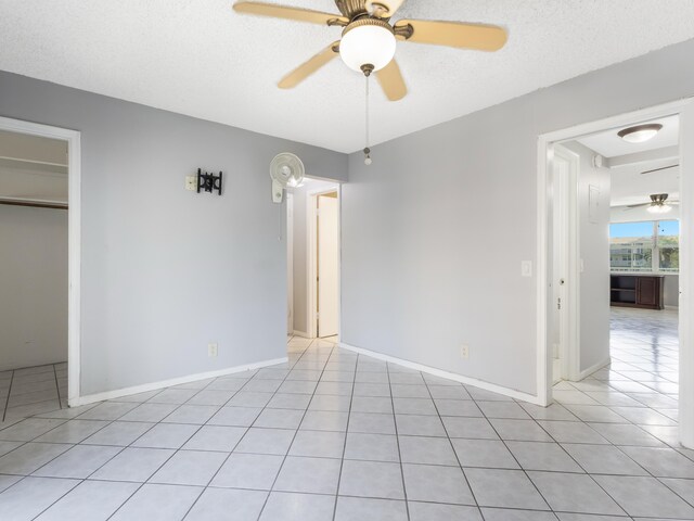 interior details featuring a tile shower