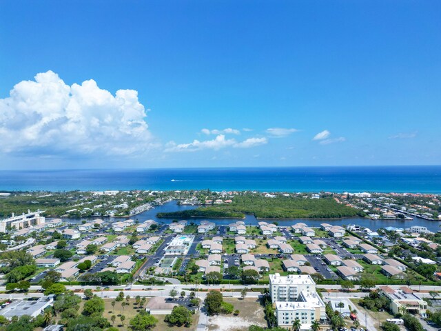 surrounding community with a water view