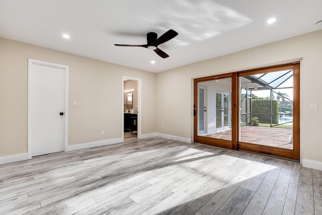 unfurnished room with recessed lighting, baseboards, light wood-style flooring, and a ceiling fan