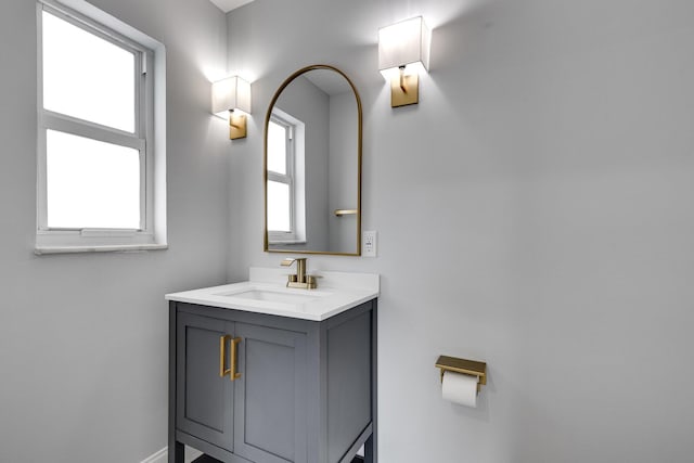 bathroom featuring vanity and baseboards