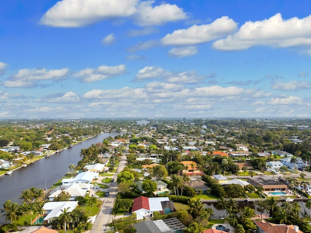 birds eye view of property featuring a water view and a residential view