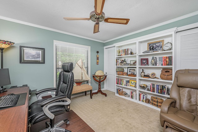 home office with baseboards, a textured ceiling, ornamental molding, and a ceiling fan