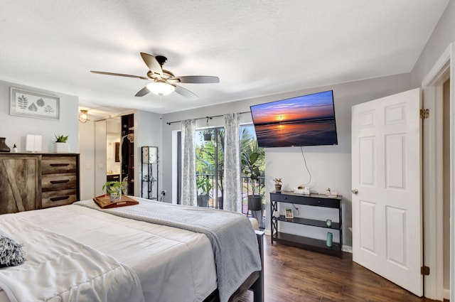 bedroom with dark wood-style floors and ceiling fan