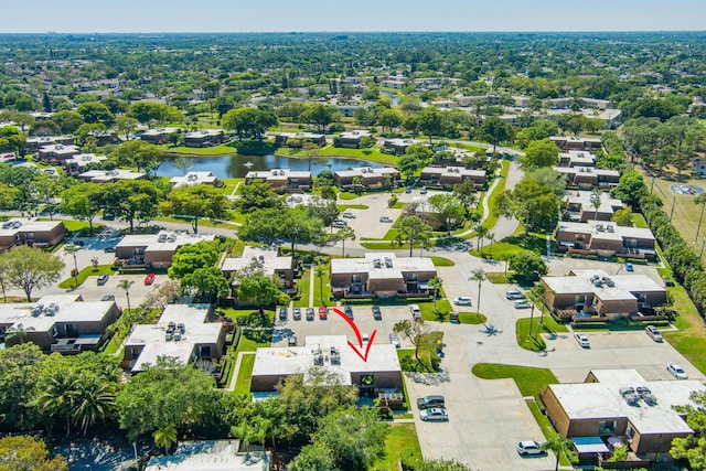 aerial view featuring a water view and a residential view