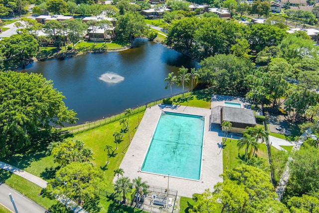 drone / aerial view with a water view