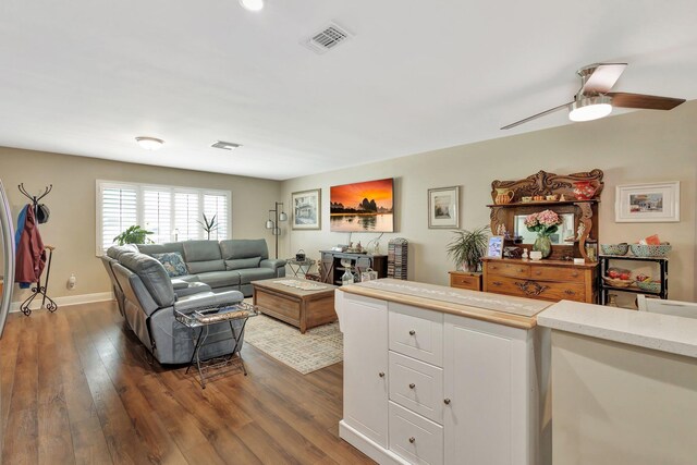 1504 SW 22nd Ave, Boynton Beach, FL 33426 - living room featuring visible vents, baseboards, dark wood-type flooring, and a ceiling fan