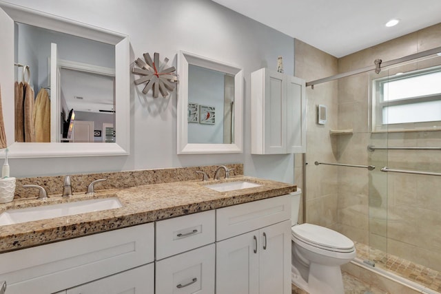 1504 SW 22nd Ave, Boynton Beach, FL 33426 - bathroom with a sink, toilet, and a shower stall
