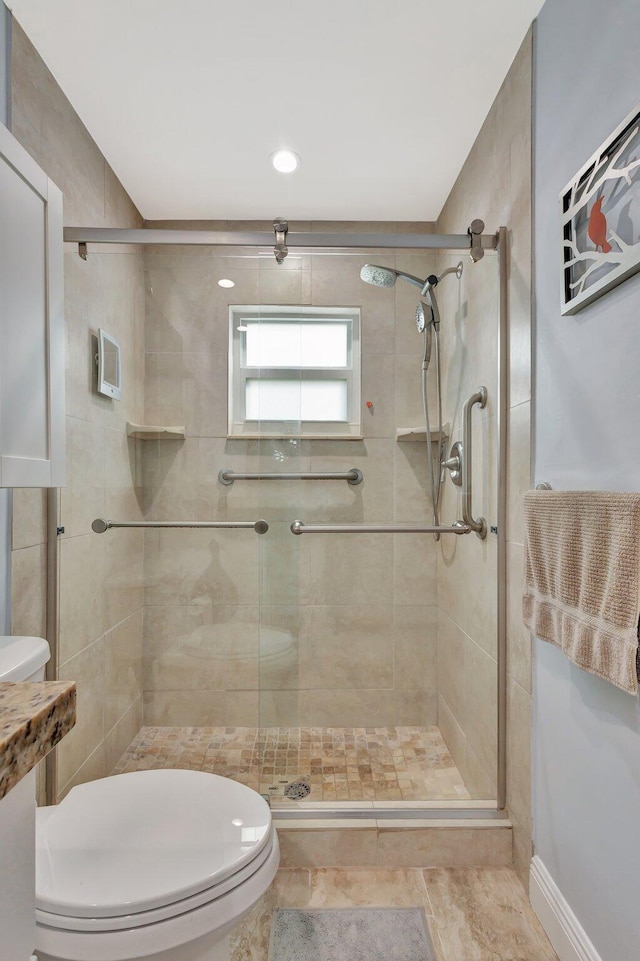 1504 SW 22nd Ave, Boynton Beach, FL 33426 - bathroom featuring a stall shower and toilet