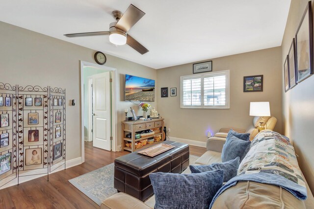 1504 SW 22nd Ave, Boynton Beach, FL 33426 - living area with a ceiling fan, wood finished floors, and baseboards