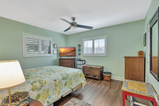 1504 SW 22nd Ave, Boynton Beach, FL 33426 - bedroom with a ceiling fan, baseboards, and wood finished floors