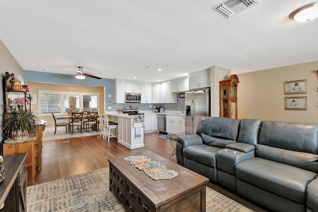 1504 SW 22nd Ave, Boynton Beach, FL 33426 - living room featuring visible vents, recessed lighting, ceiling fan, and wood finished floors