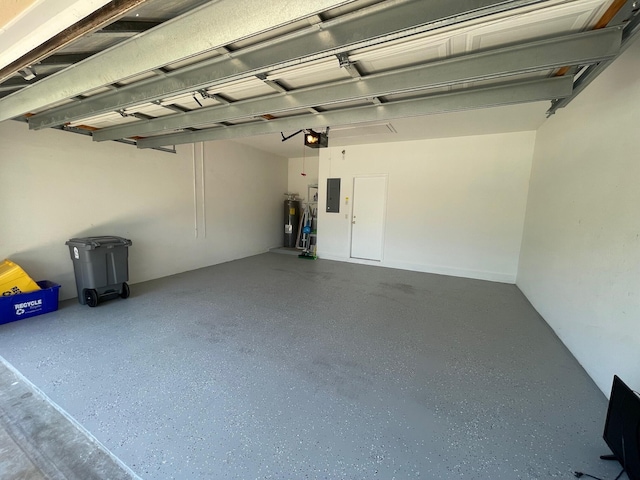 9675 Crescent View Dr N, Boynton Beach, FL 33437 - garage with electric panel, electric water heater, and a garage door opener