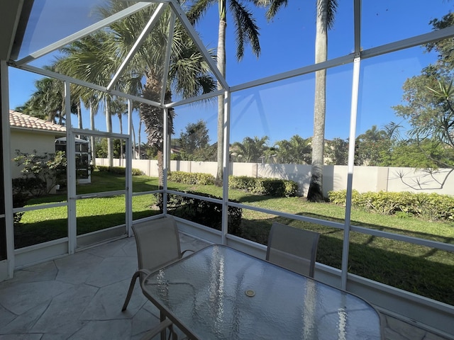 9675 Crescent View Dr N, Boynton Beach, FL 33437 - unfurnished sunroom with outdoor dining space