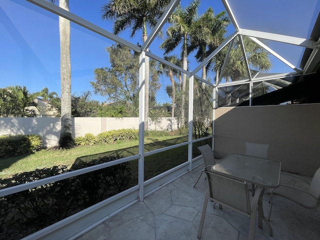 9675 Crescent View Dr N, Boynton Beach, FL 33437 - sunroom / solarium featuring outdoor dining space