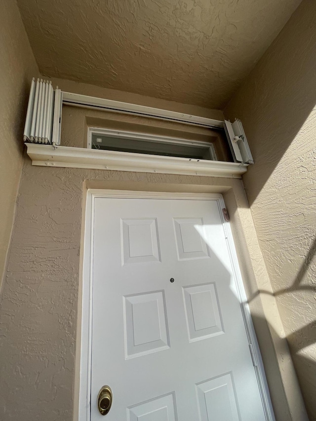 9675 Crescent View Dr N, Boynton Beach, FL 33437 - detailed view of stucco siding
