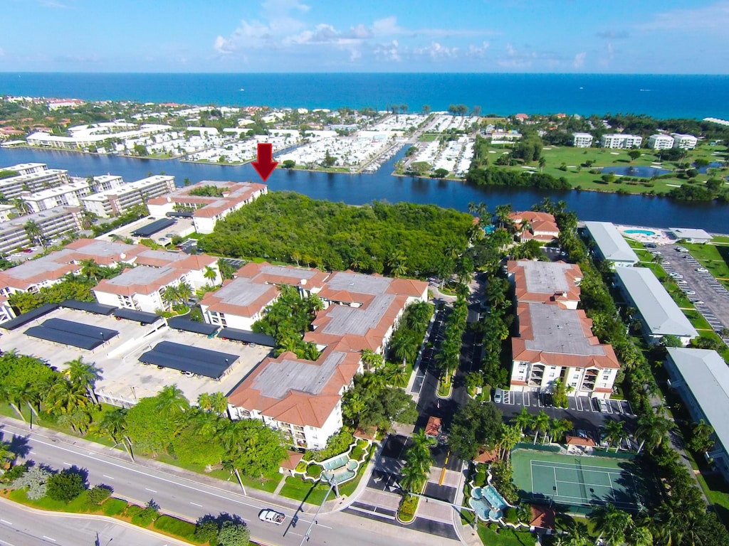 drone / aerial view with a water view