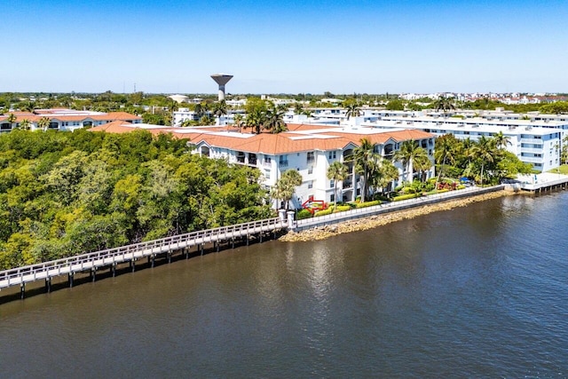 birds eye view of property featuring a water view