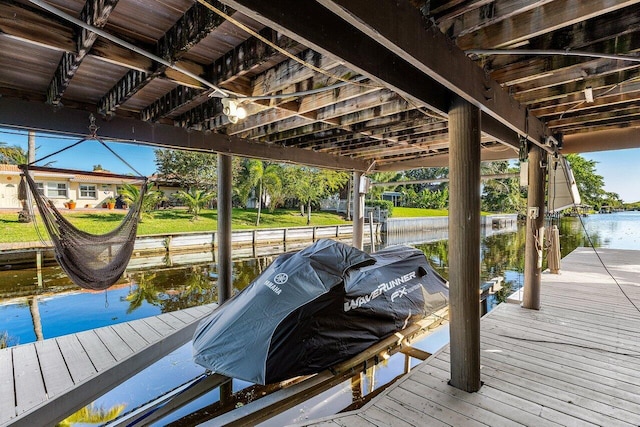 dock area featuring a water view