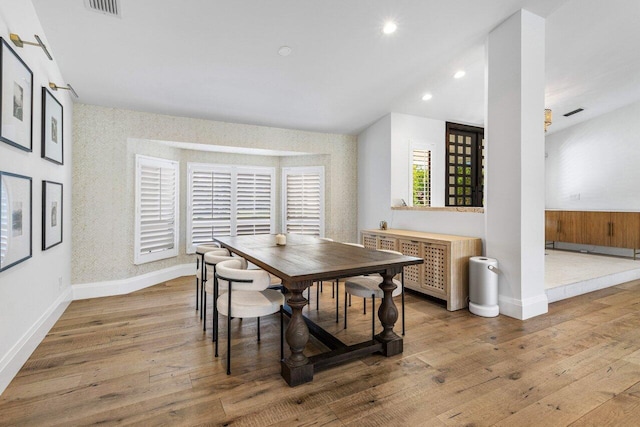 dining area with recessed lighting, visible vents, baseboards, and hardwood / wood-style flooring