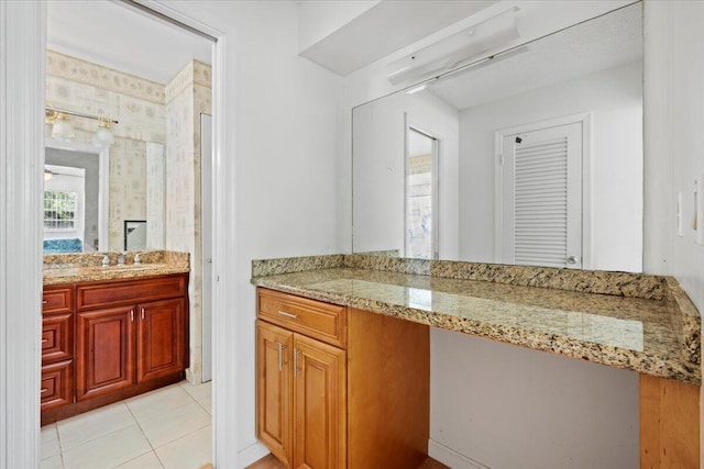 bathroom featuring vanity and tile patterned flooring