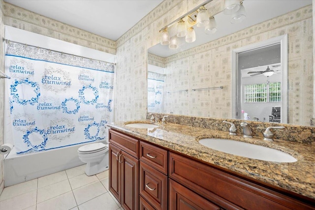 full bath featuring tile patterned floors, toilet, wallpapered walls, and a sink