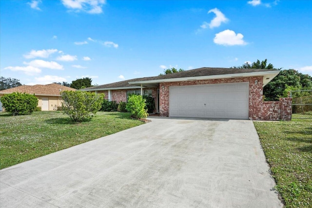 ranch-style home with a front yard, fence, an attached garage, concrete driveway, and brick siding