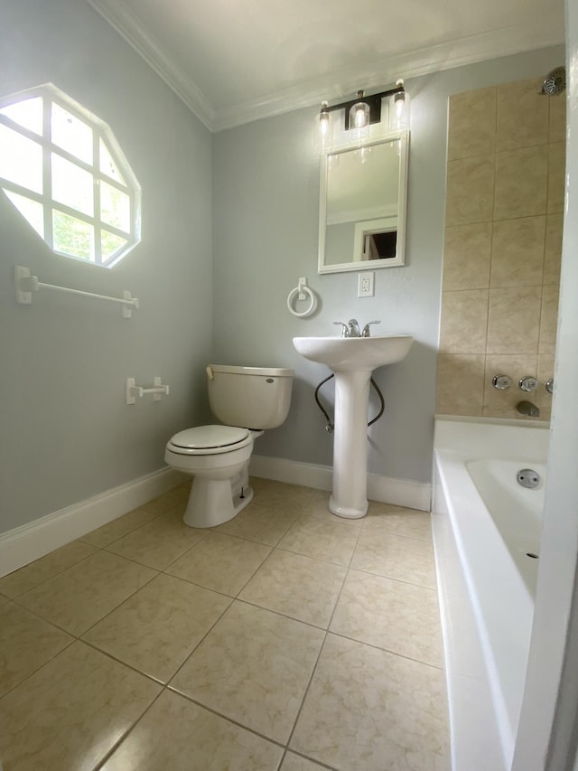 bathroom with tile patterned floors, baseboards, toilet, and crown molding