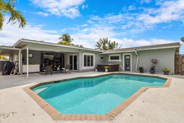 1351 SE 7th Ave, Pompano Beach, FL 33060 - back of house with a patio, stucco siding, an outdoor pool, and fence