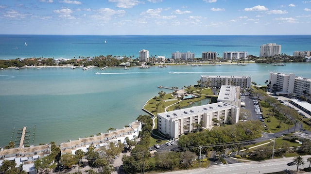 bird's eye view featuring a view of city and a water view