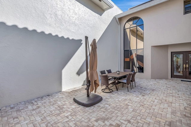 view of patio / terrace featuring outdoor dining area and french doors