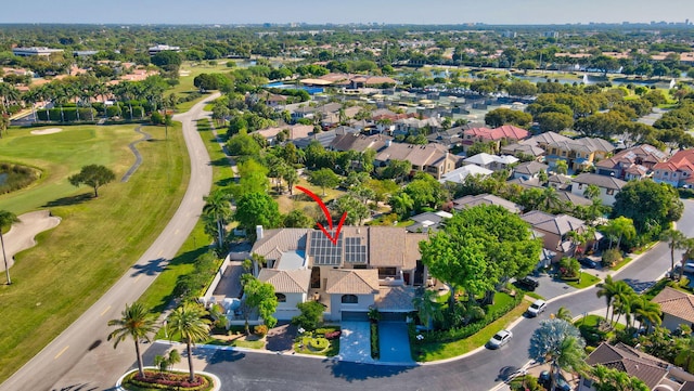 aerial view featuring a residential view and view of golf course